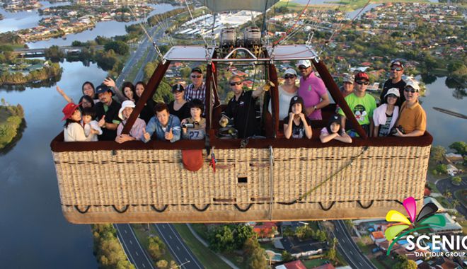 Scenic TOUR 12 happy tour group ballooning over the gold coast